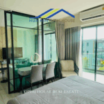 Living room with large windows and sea breeze view – Carapace Hua Hin condo for sale