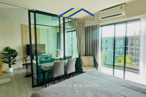 Living room with large windows and sea breeze view – Carapace Hua Hin condo for sale