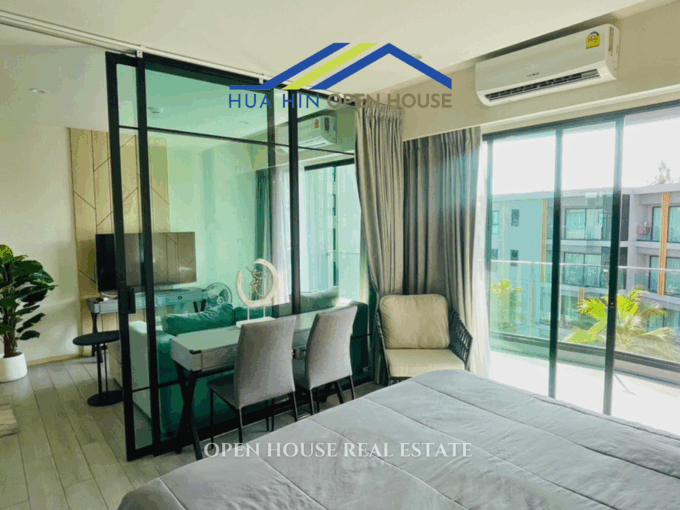 Living room with large windows and sea breeze view – Carapace Hua Hin condo for sale