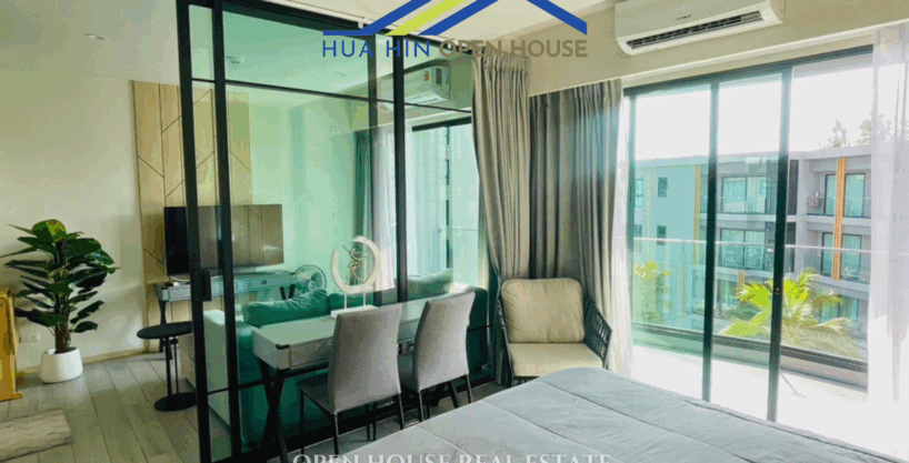 Living room with large windows and sea breeze view – Carapace Hua Hin condo for sale