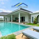 Modern 3-bedroom pool villa in Hua Hin Soi 112 with saltwater pool, landscaped garden, and two covered terraces.