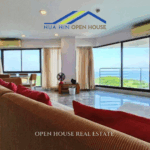 Spacious living room with sea view balcony at Palm Pavilion Hua Hin condo