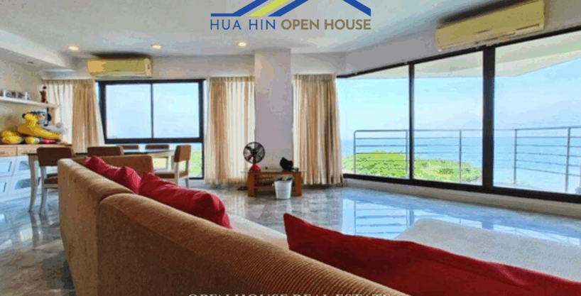 Spacious living room with sea view balcony at Palm Pavilion Hua Hin condo